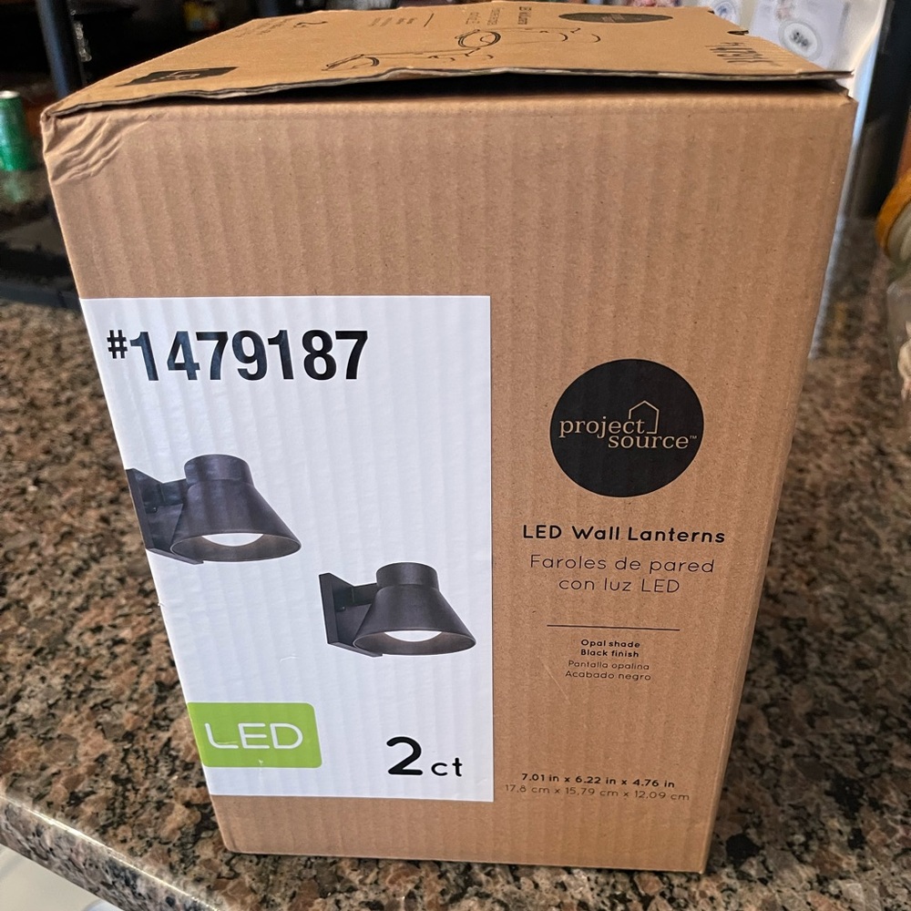 Set of to light fixtures new in box .
